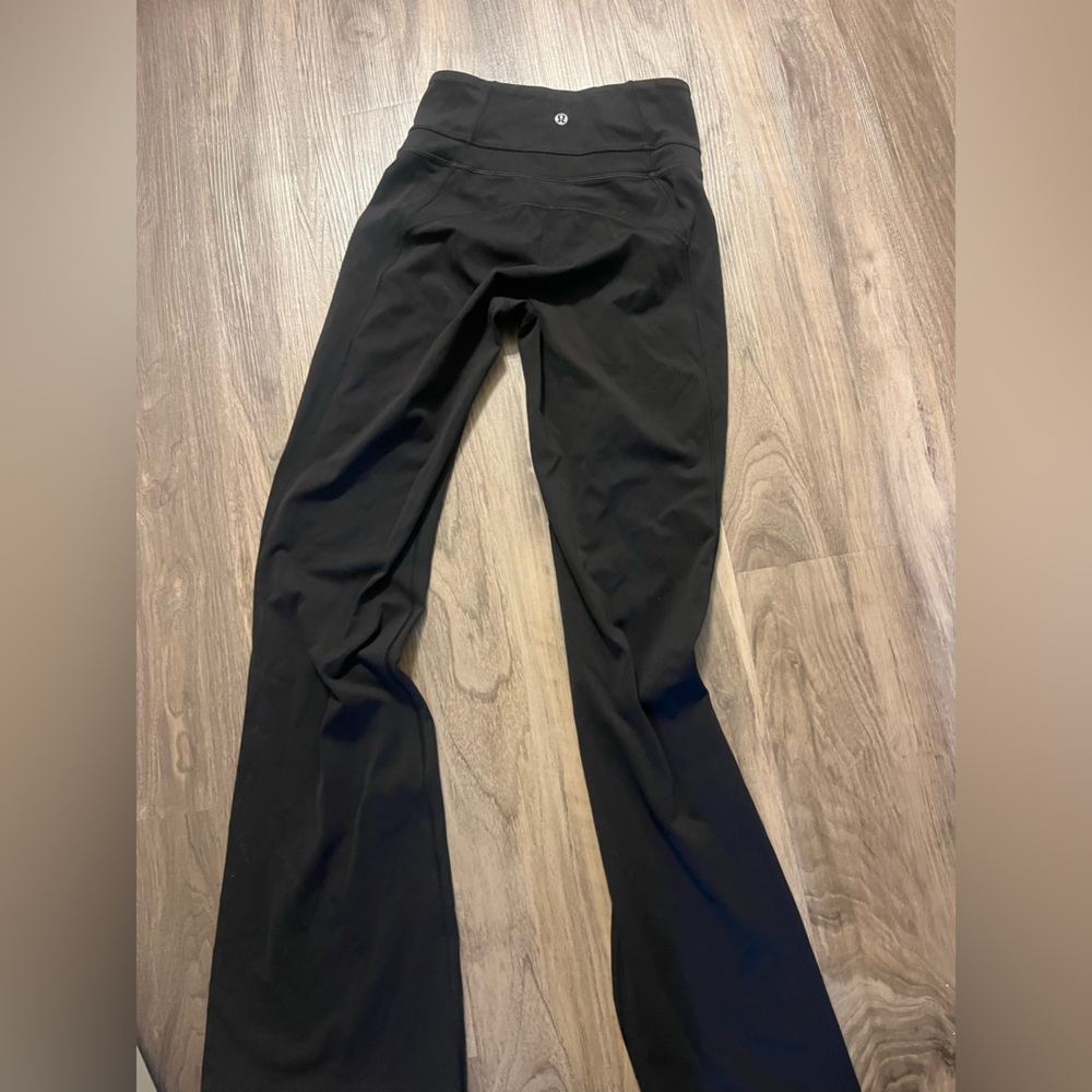 Women's Black Lululemon Groove pant size 4 super high rise